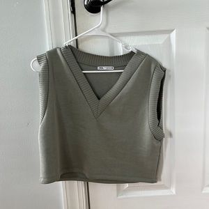 cropped green sweater vest